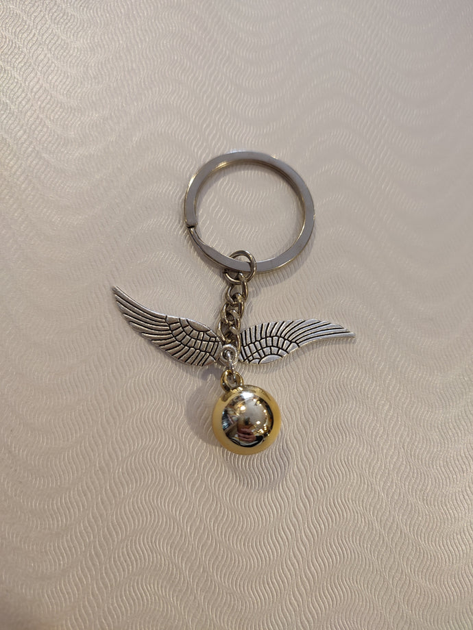 Llavero metalico Snitch Dorada